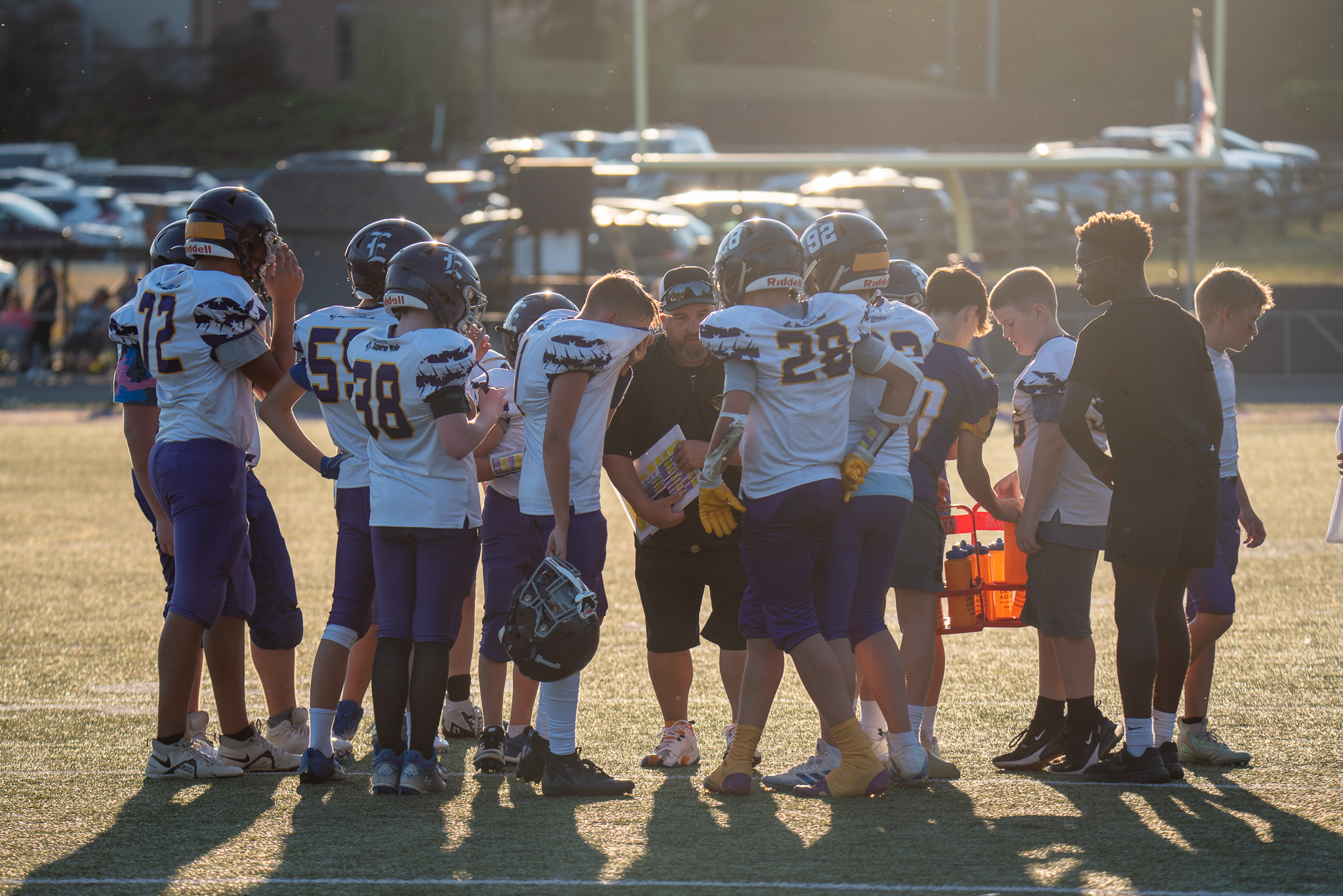Team huddle during a ephrata youth football game